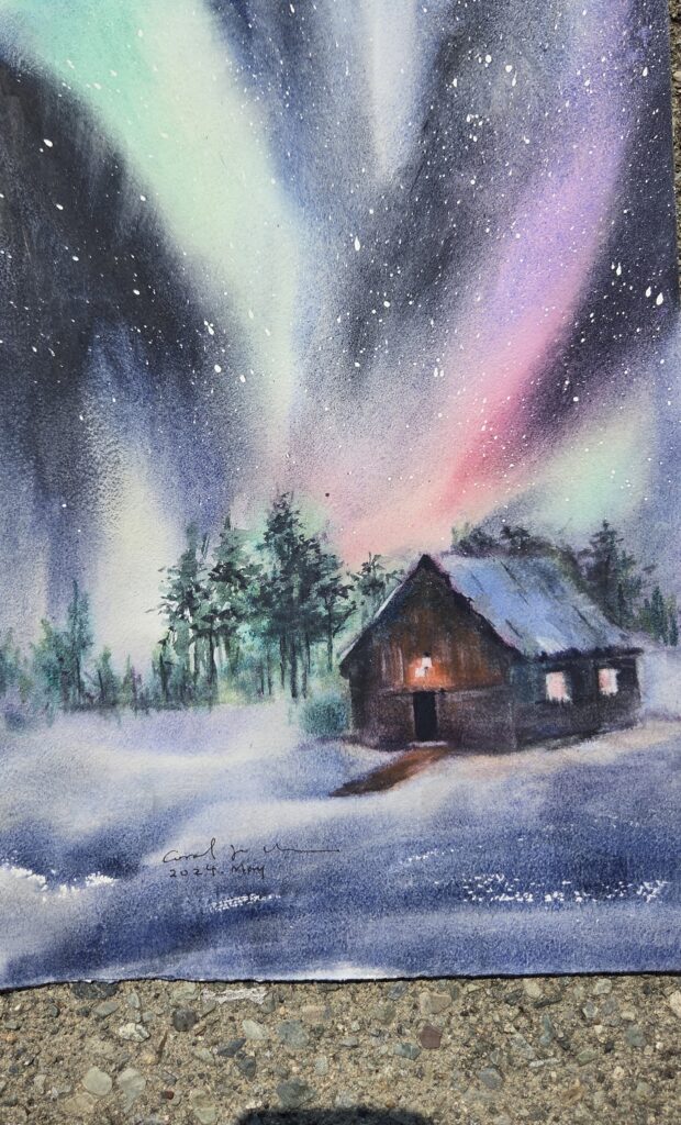 A watercolour night scene of the aurora borealis glowing over a snowy cabin.