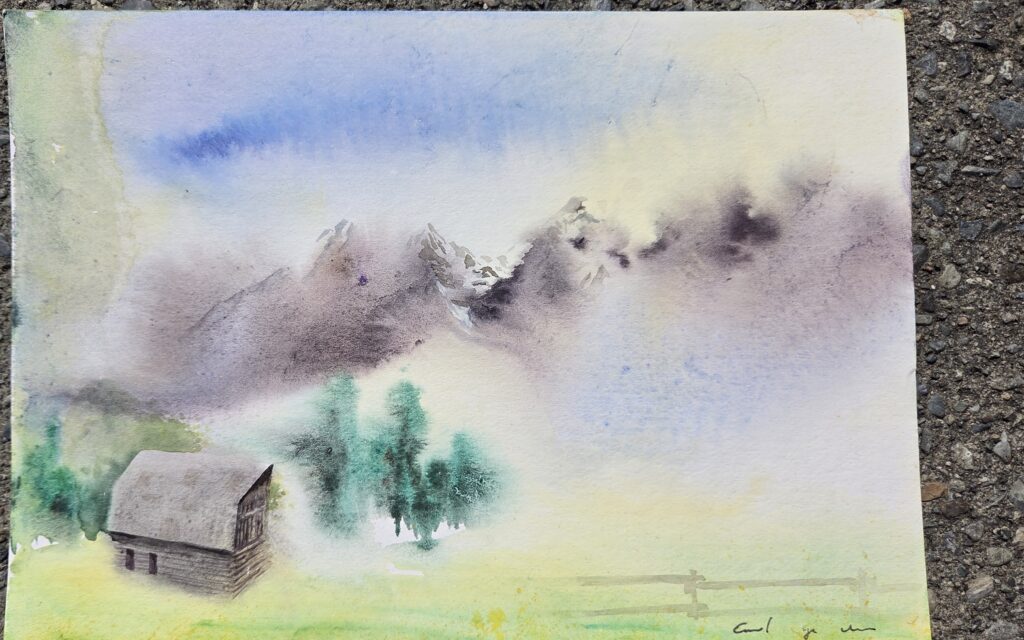 A watercolour painting of a barn beneath golden mountain peaks.